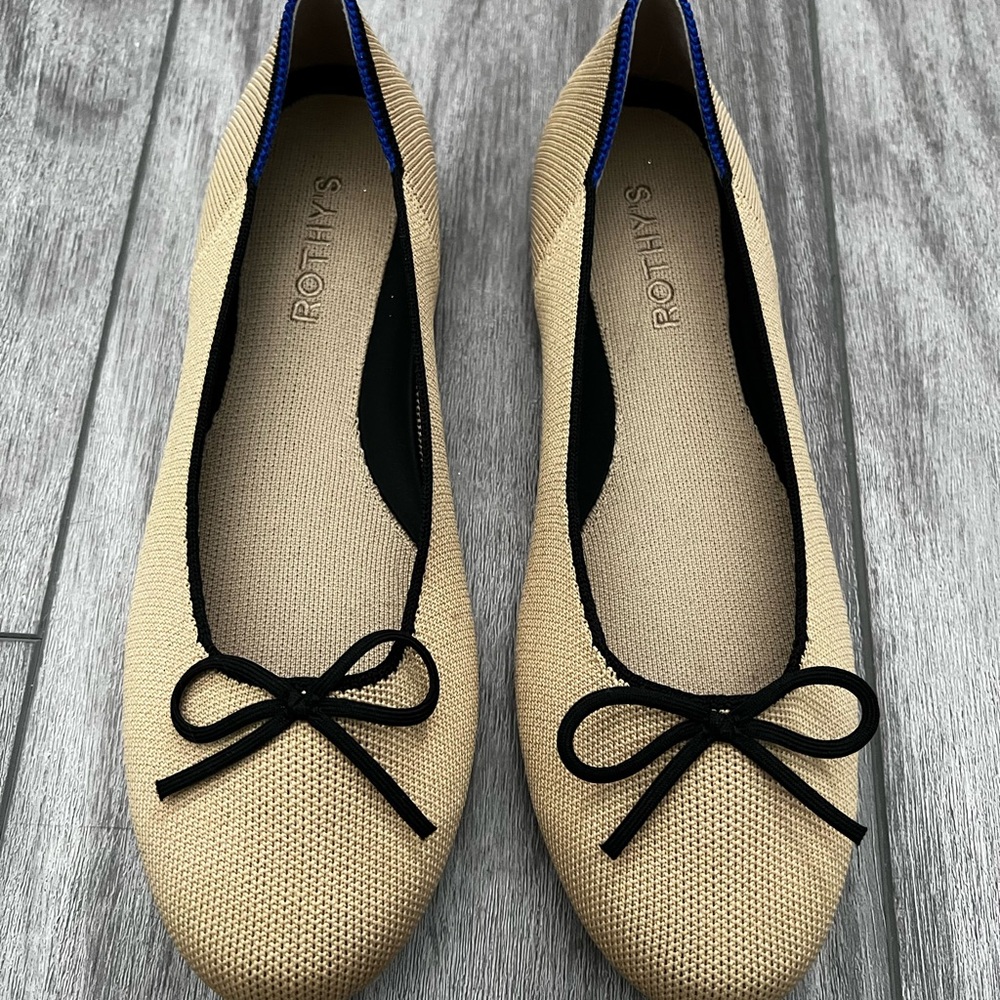 Rothy's Tan and Black Flats Elegant Design NEVER WORN. Do not have the box.